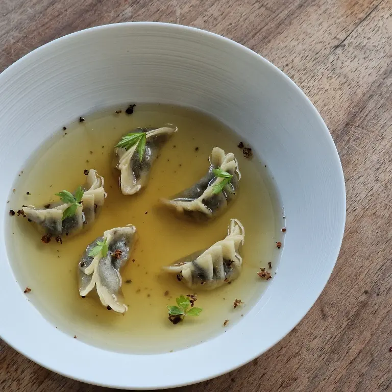 creation thumb for Dumplings aux Champignons & Consommé de Caille