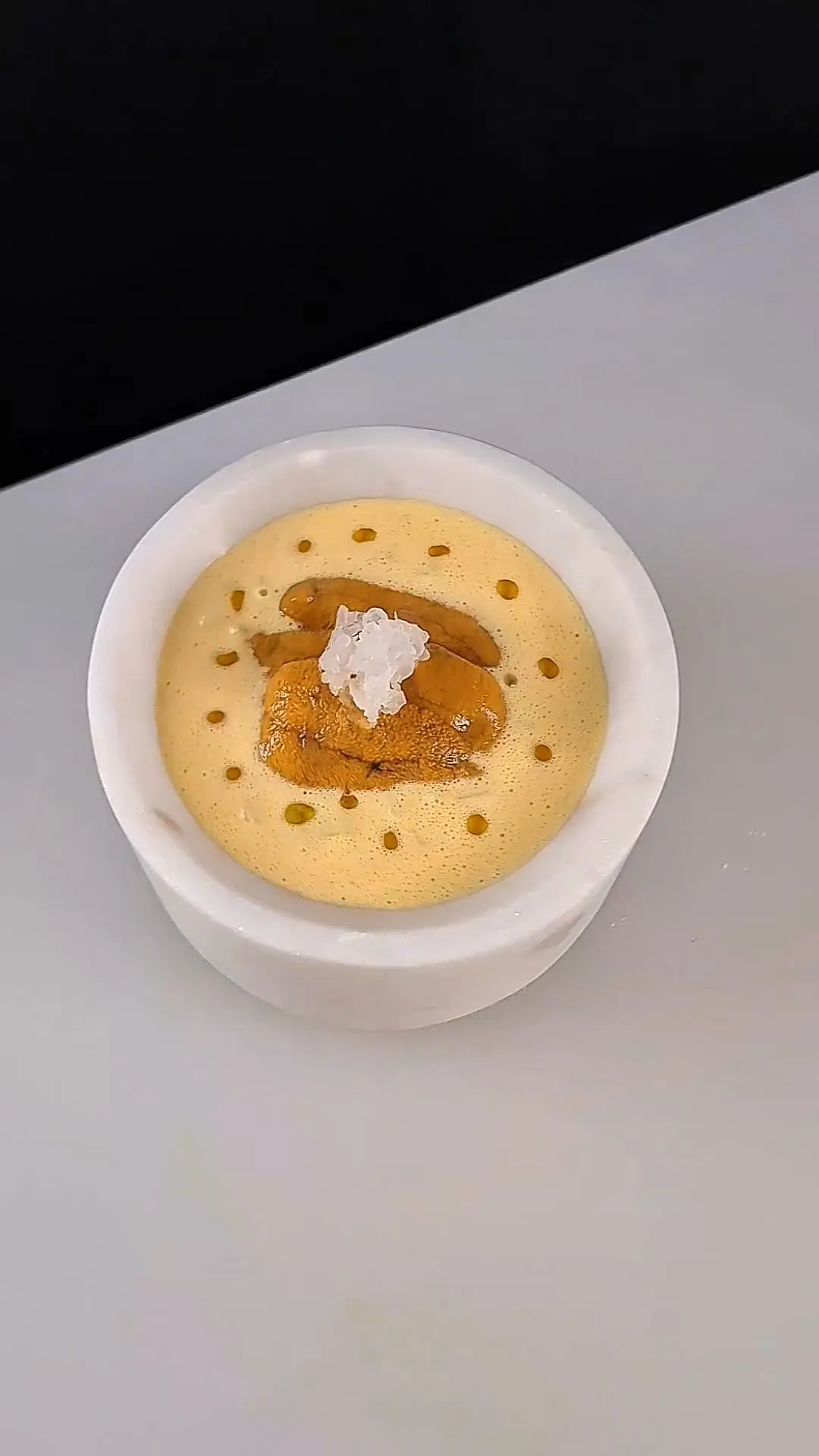 creation thumb for Sea urchin with umami butter & mango