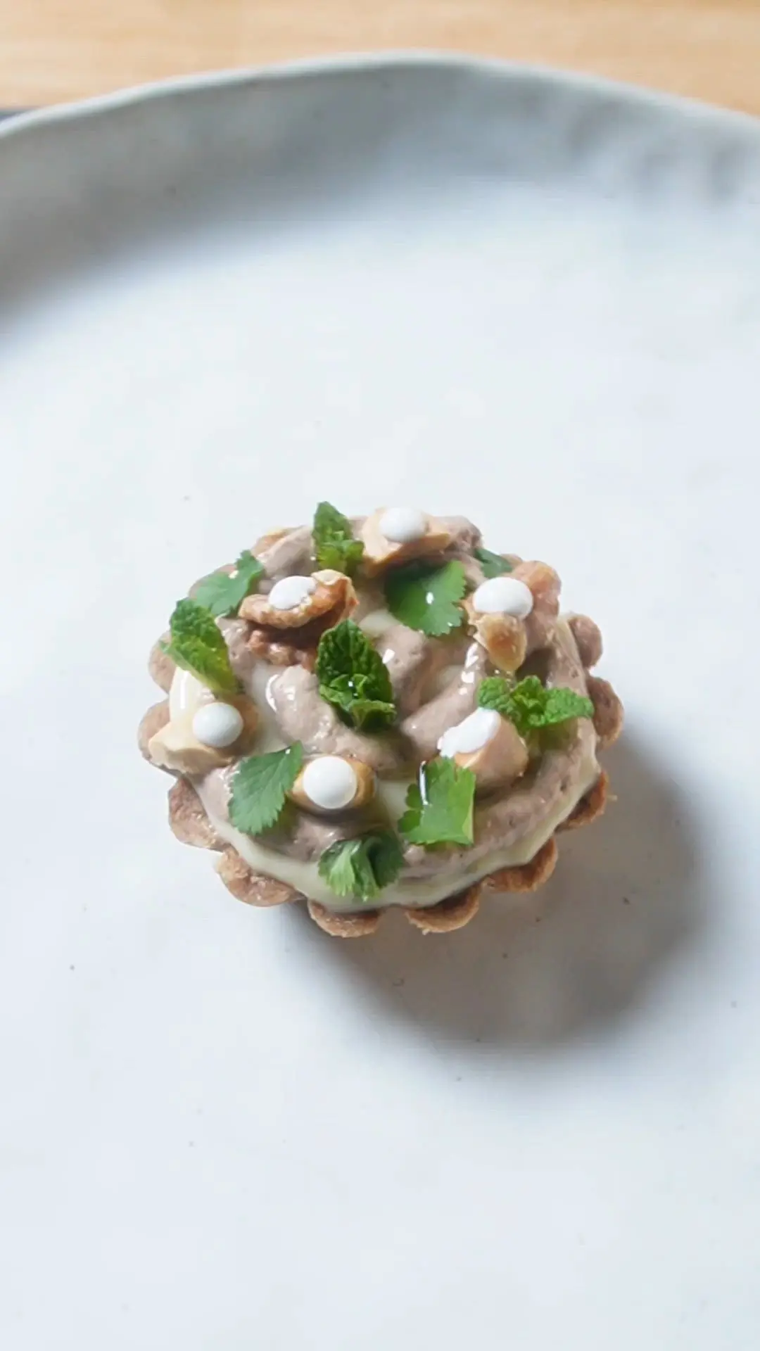 creation thumb for Carob Tartlet with Custard, Carob Cream, Nuts & Fresh Herb