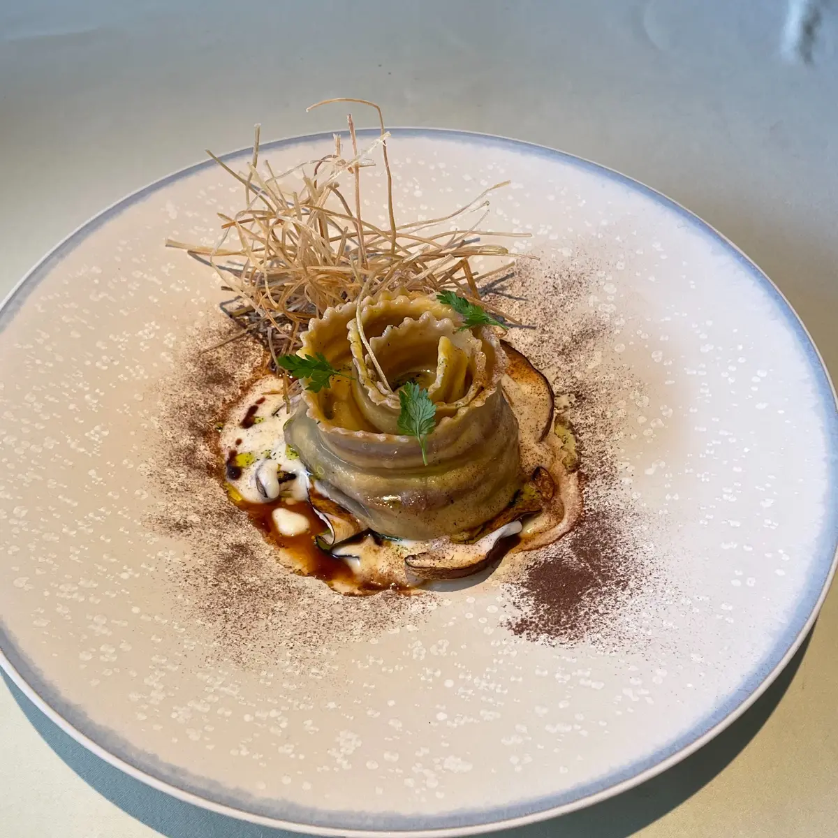 creation thumb for Rolled Raviolo with Porcini Mushrooms and Parmesan Cream