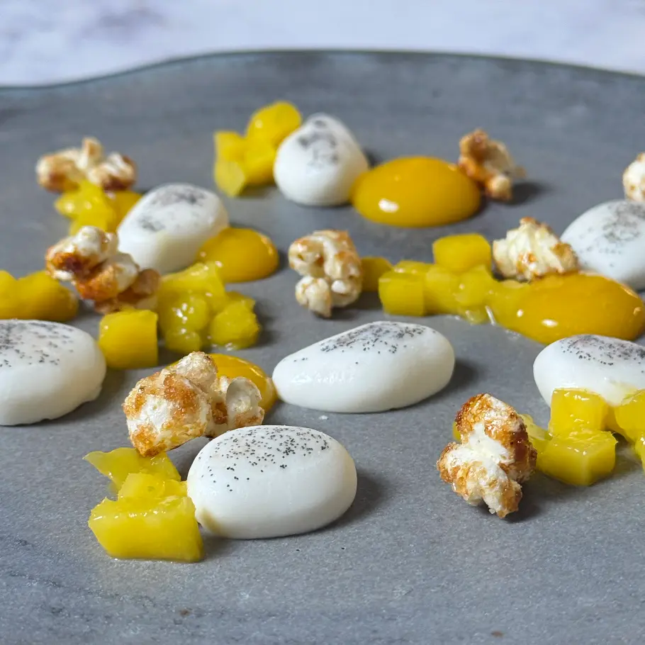 creation thumb for Panna Cotta Stones with Caramelised Popcorn and Mango