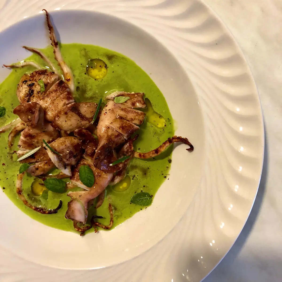 creation thumb for Roasted squid with cucumber and zucchini leaves vinaigrette.