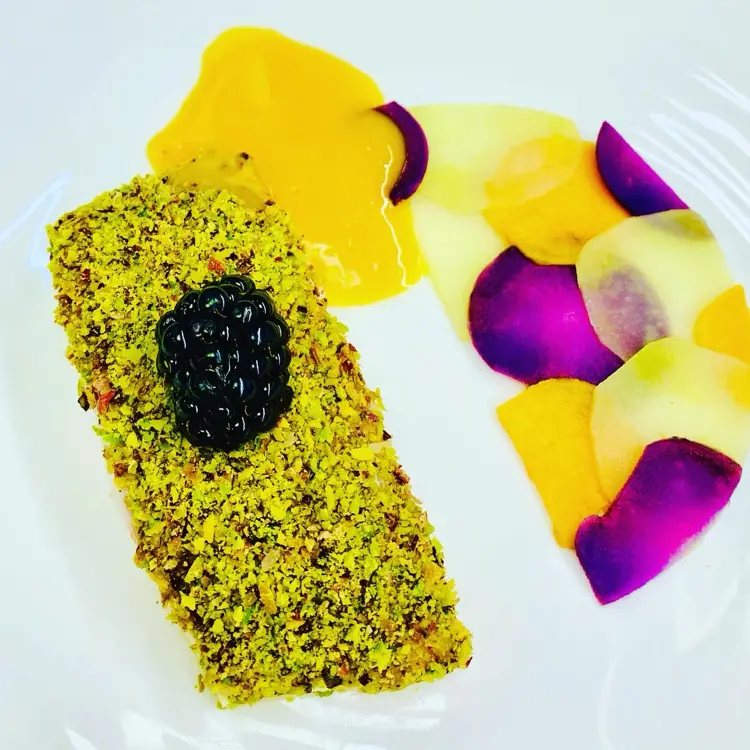 creation thumb for sea ​​bass ,passion fruit ,potatoes .pistachios