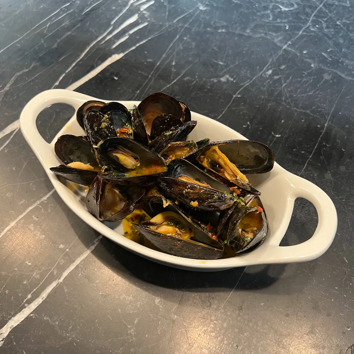 creation thumb for Herb grilled mussels with alabrian Chile butter