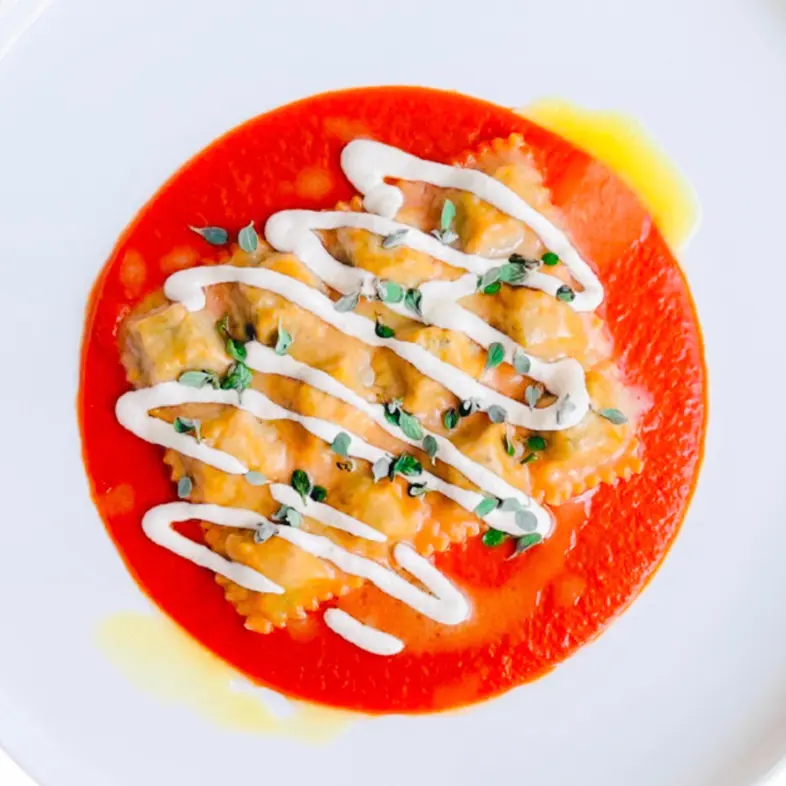 creation thumb for Raviolo, burro alla maggiorana, salsa di pinoli e pomodoro