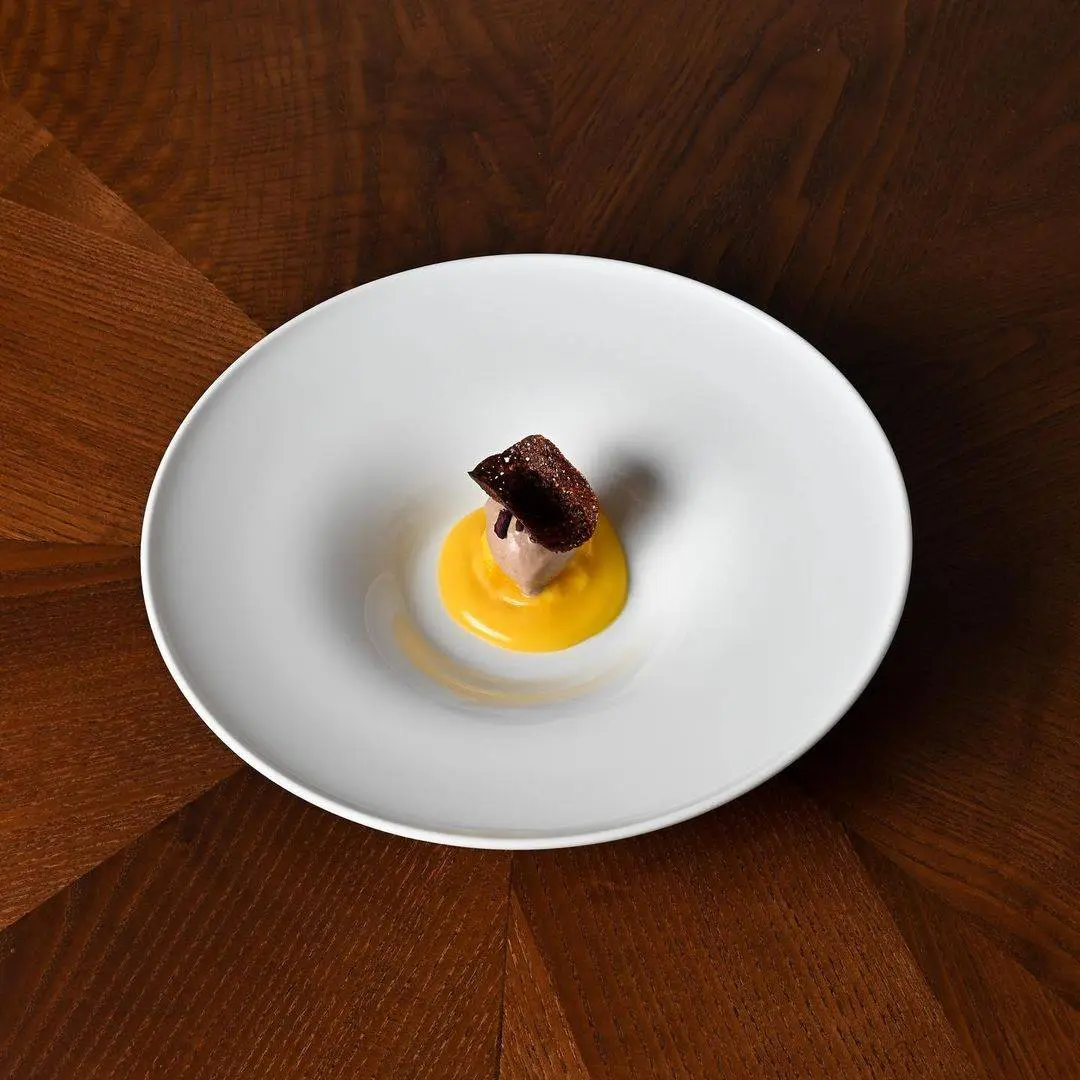 creation thumb for Olive ice cream, oil and orange emulsion, pastazzo and cocoa