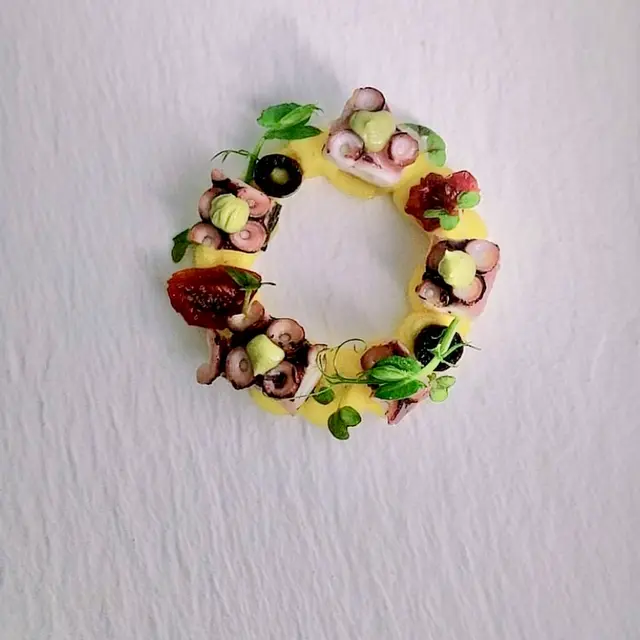 creation thumb for Potato puree with octopus, black olives and dried tomato