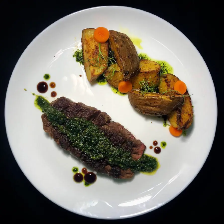 creation thumb for veal with chimichuri sauce and baked potatoes
