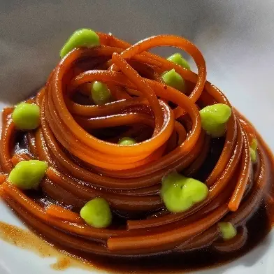 creation thumb for Black garlic spaghetti with octopus jus and friggitelli cream
