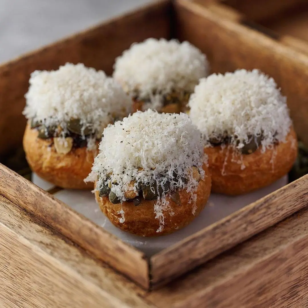 creation thumb for 5 year old parmesan, black garlic honey, toasted pumpkin see