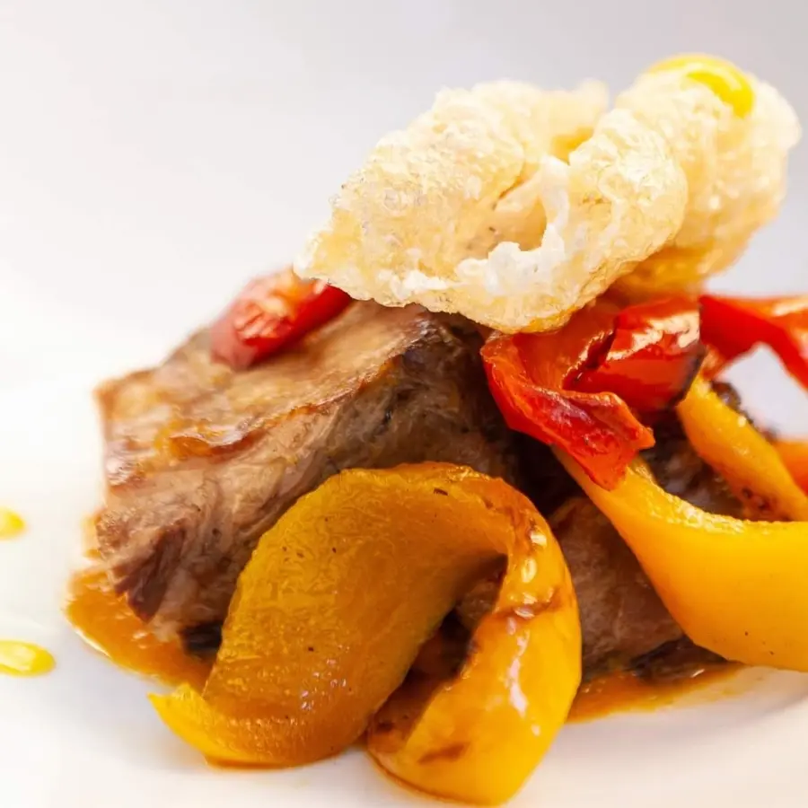 creation thumb for Sous vide pork, pepper chutney, smoked pepper, chicharron and salad lemon curd.