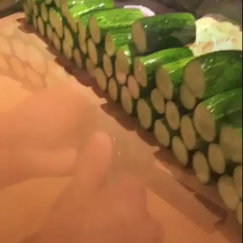 creation thumb for Cucumber with a knife.