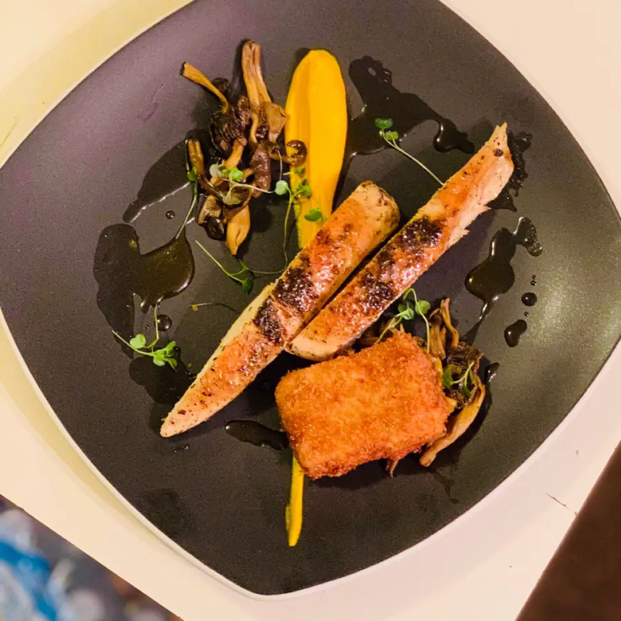 creation thumb for AppleWood Infused Chicken, Carrot, Smoked Gouda Grits, Trumpet Mushrooms, orange Gastrique