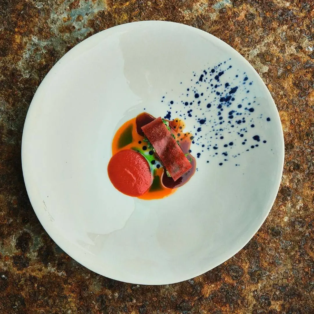 creation thumb for Lamb Saddle, rakı-infused lettuce, red pepper leather 