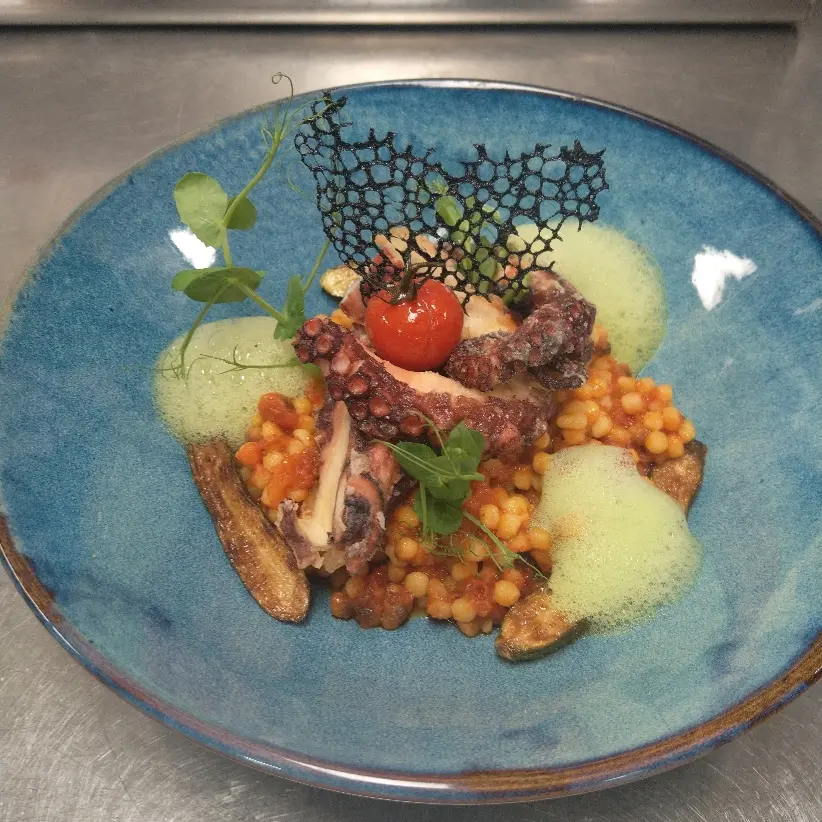 creation thumb for Pulpo Fregola Sarda smoked tomatoes basil