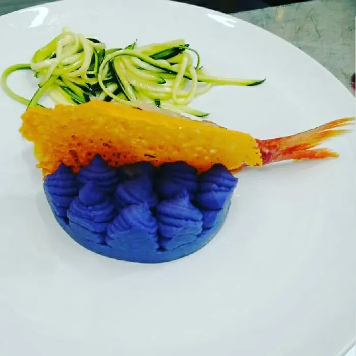 creation thumb for Triglia sul fondale, scoglio di patata viola, corallo di pomodoro, alghe di zucchine, fumetto all'arancia
