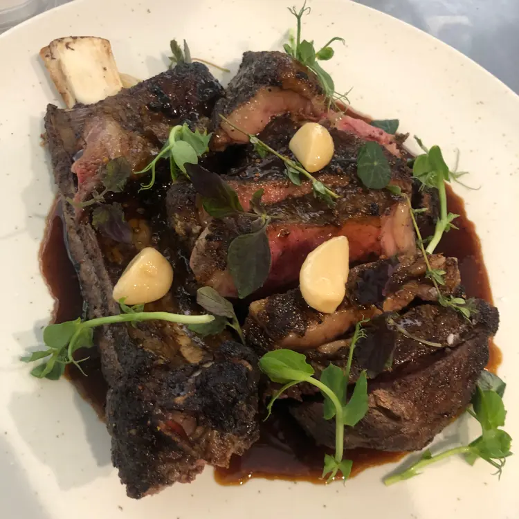creation thumb for Savannah Rib Eye On Bone/Mustard Jus/Confit Garlic