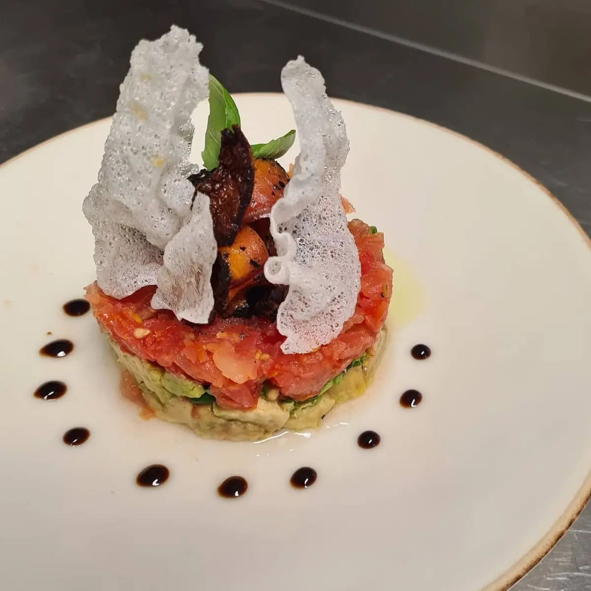 creation thumb for Tomato and avocado tartare with onion sautéed pickled trout and fried rice paper