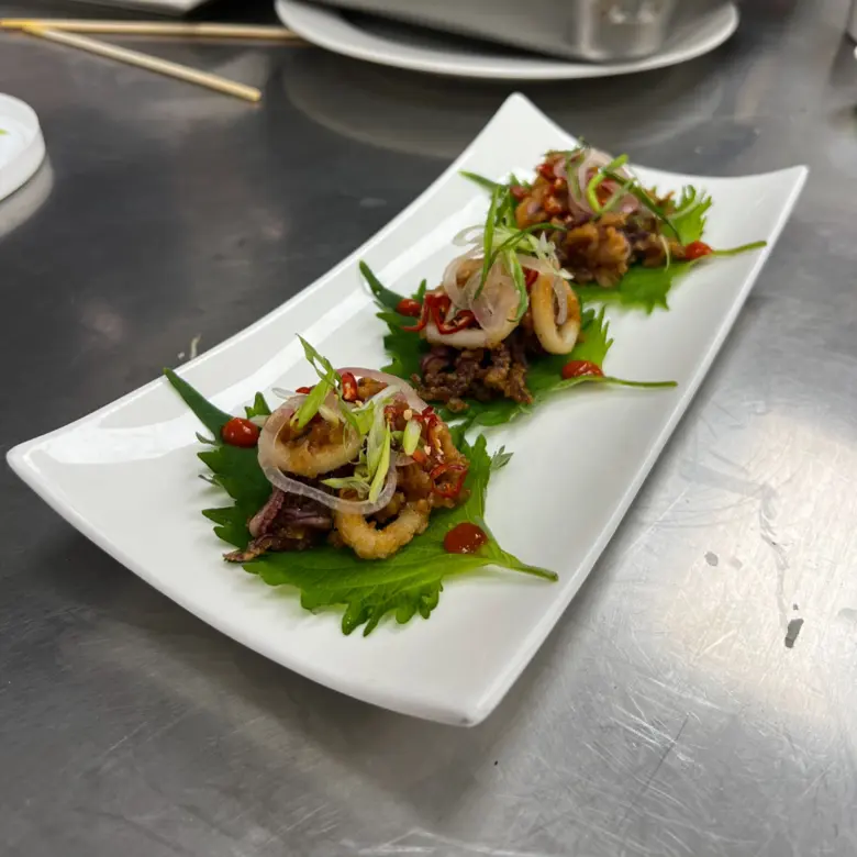 creation thumb for Glazed calamari on shiso leaves
