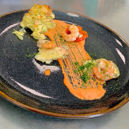 creation thumb for Mussels and oysters gratin with parmesan on a bed of potatoes
