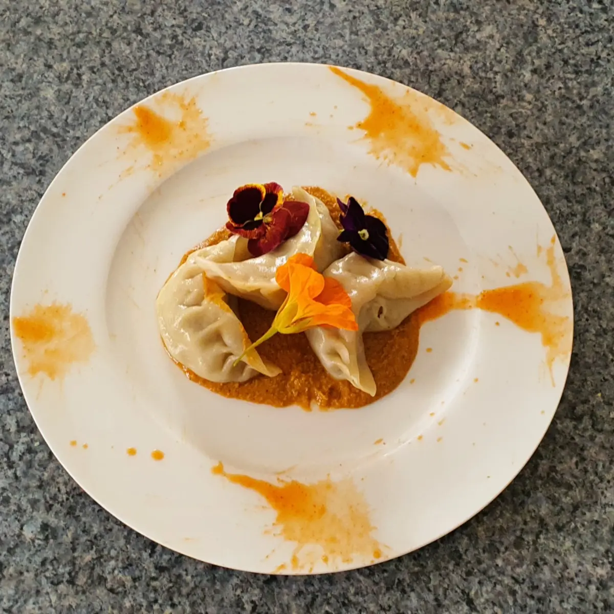 creation thumb for Turkey momo (dumplings) with Asian spicy tomato sauce