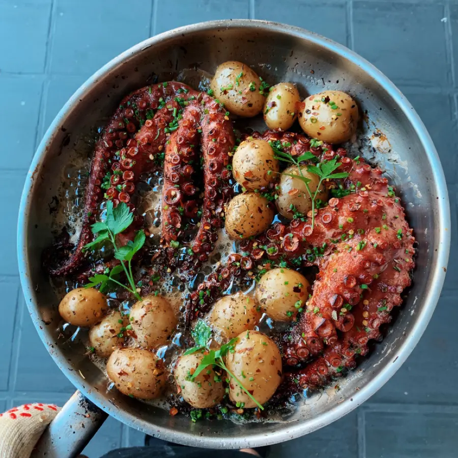 creation thumb for octopus with roasted potatoes and herbs.